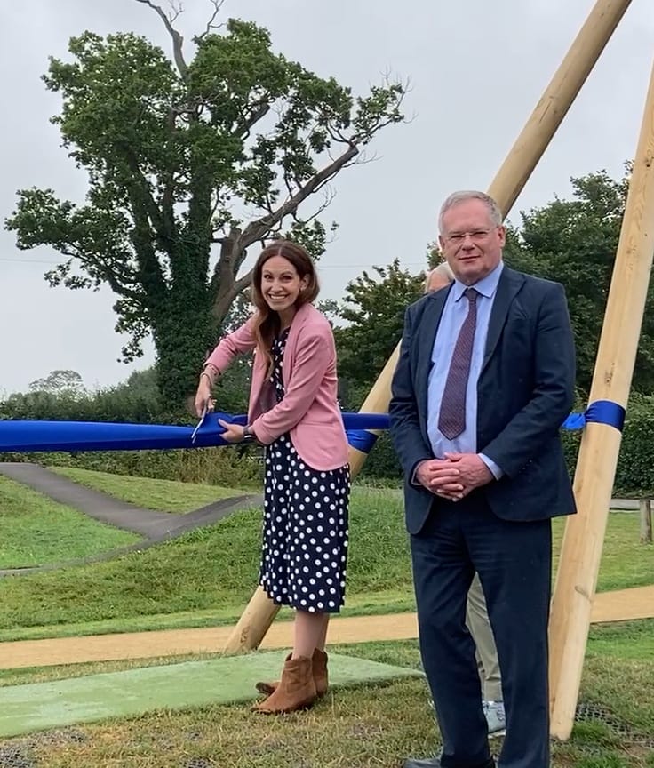 Aphra Brandreth MP cutting the ribbon of the upgraded Little Heath Play area alongside CPC chair Luke Henley